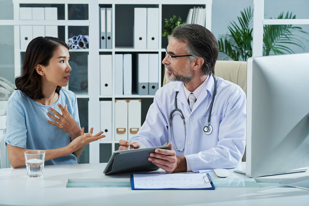 patient-telling-doctor-about-symptoms-disease