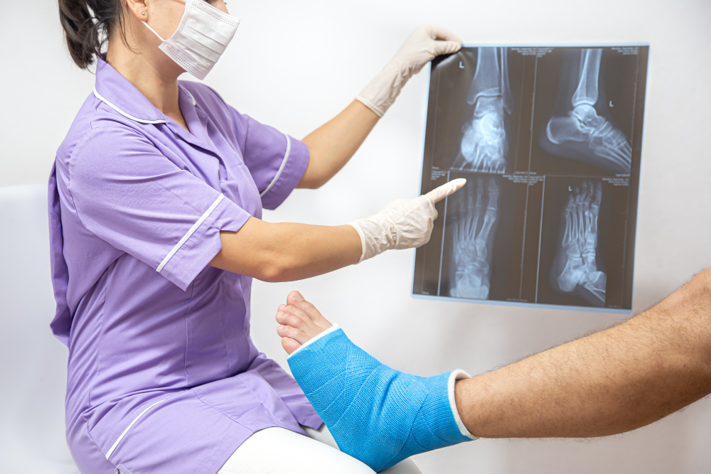 Bone fracture foot being examined by a doctor